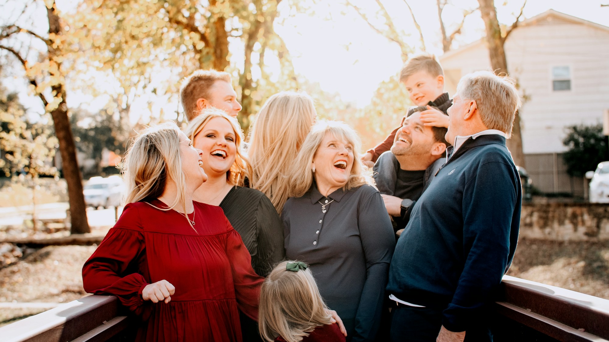 A multi-generational family standing together